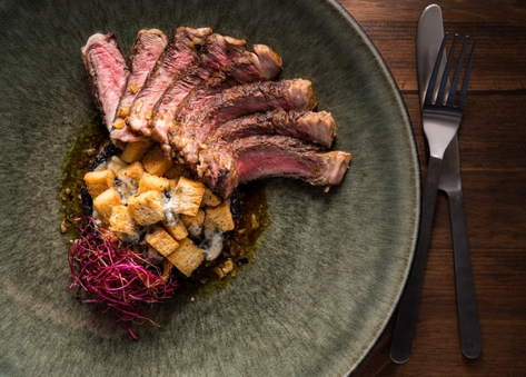 Australian rib eye with marinated portabella mushrooms and blue cheese